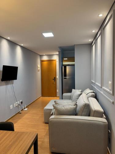 Et tv og/eller underholdning på Apartamento aconchegante