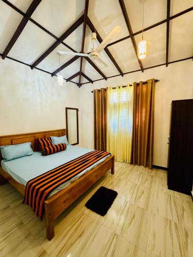 Ένα ή περισσότερα κρεβάτια σε δωμάτιο στο Green field Inn