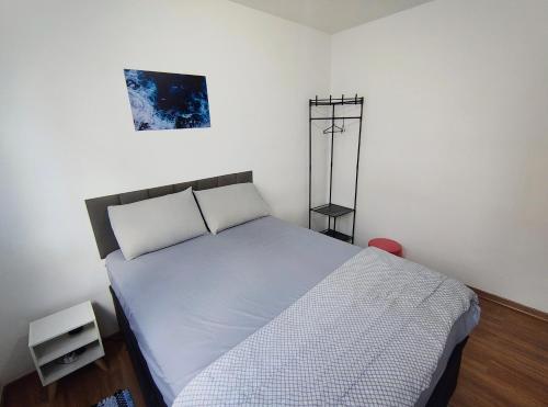 Giường trong phòng chung tại Apartamento Tranquilidade!