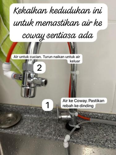 a sink with the words kerala requethan in unit meruvian american at B3A-5 Suites in Papar