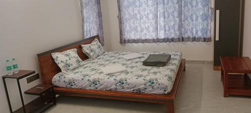 Cama o camas de una habitación en Iniyan Nestle