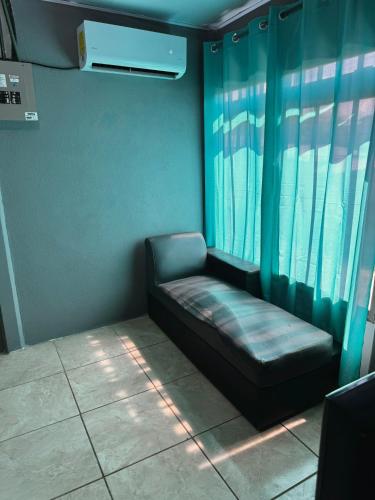 Postel nebo postele na pokoji v ubytování Manzano lodge