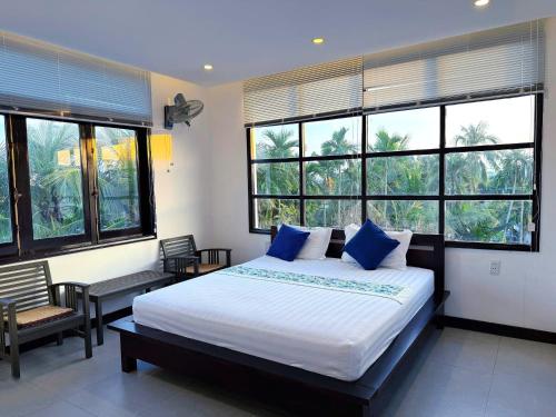 Postel nebo postele na pokoji v ubytování HOI AN LOTUS AROMA VILLA - FOUR BIG ROOM