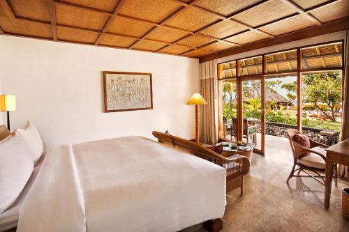 Cama o camas de una habitación en The Oberoi Beach Resort, Bali