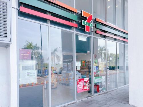 a store front with a sign on the front of it at Silverscape Seaview Residence Melaka in Melaka