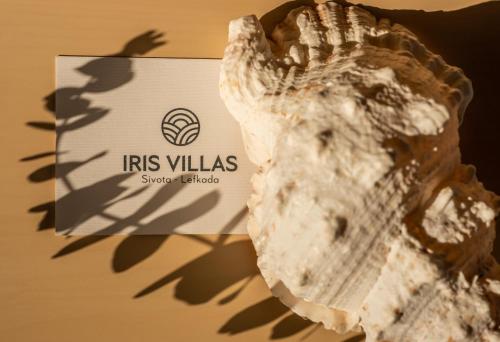a shell with the logo of its villas sugarfield at Iris Villas Lefkada - Marine Villa with private sea access in Sivota