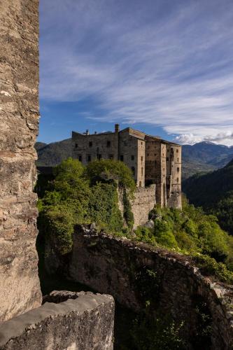 an old castle on top of a mountain at Castel Pergine in Pergine Valsugana