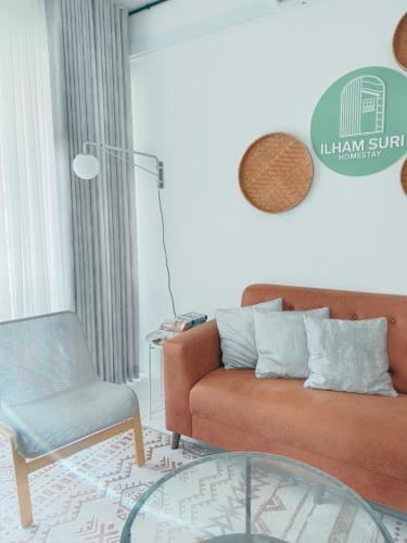 Χώρος καθιστικού στο ILHAM SURI Boho Apartment in Wakaf Che Yeh