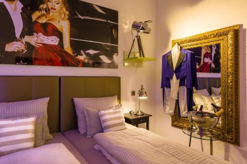 Una cama o camas en una habitación de Wuschl Lounge
