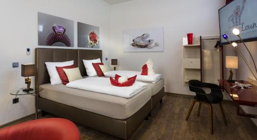 Una cama o camas en una habitación de Wuschl Lounge