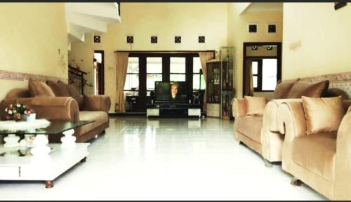 Un lugar para sentarse en Blessed Vintage Villa Batu Malang