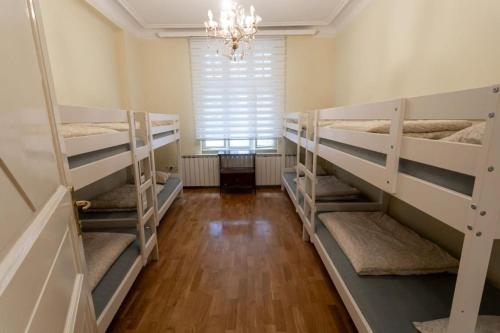 Posteľ alebo postele v izbe v ubytovaní K Nest