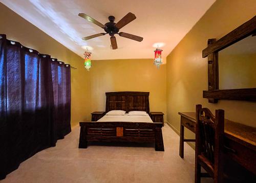 Katil atau katil-katil dalam bilik di 3 Bedroom Property in the Heart of Coron