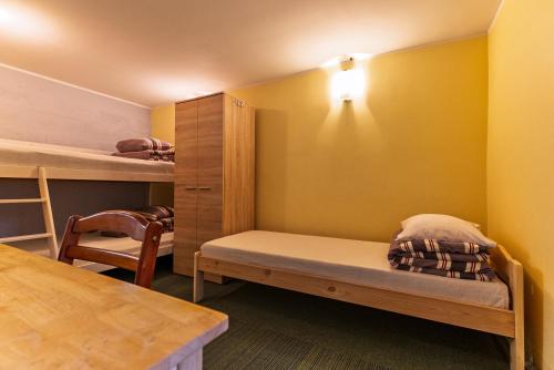 Postel nebo postele na pokoji v ubytování IDA Apartments