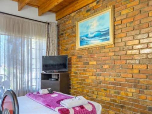 TV o dispositivi per l'intrattenimento presso Royal Olympia Lodges & Safaris RSA