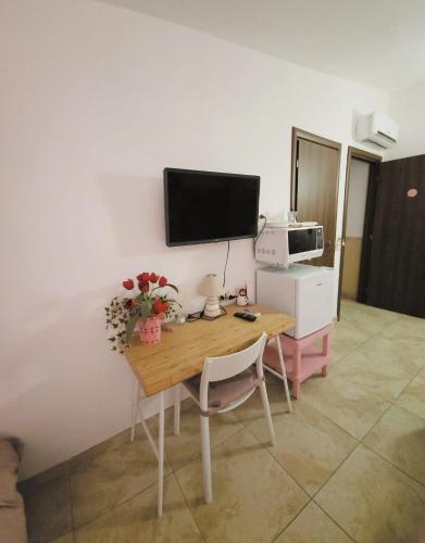 Televisyen dan/atau pusat hiburan di B&B Casa Rosola