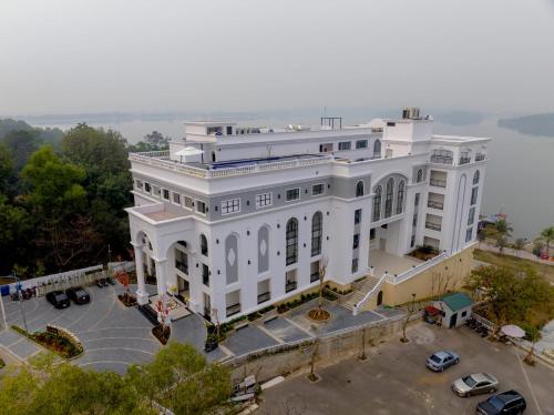 an aerial view of a white building at Belliss Hotel And Spa Dai Lai in Phúc Yên