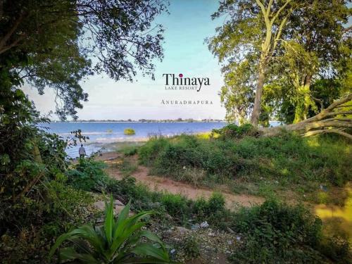 a sign that reads thimseyaeusaeusaeusaeusearchivedivedivedived at Thinaya Lake Resort in Anuradhapura