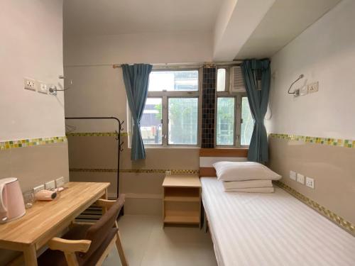 Postel nebo postele na pokoji v ubytování Comfort Hostel