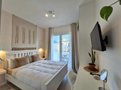 Postel nebo postele na pokoji v ubytování Stazione Rooms