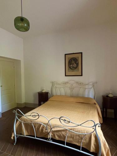 Letto o letti in una camera di Fattoria Barca Colonna