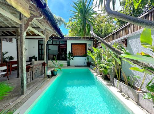 a pool in the backyard of a villa at Villa Bambu - 2BR Pool Villa in Central Bukit Uluwatu in Uluwatu