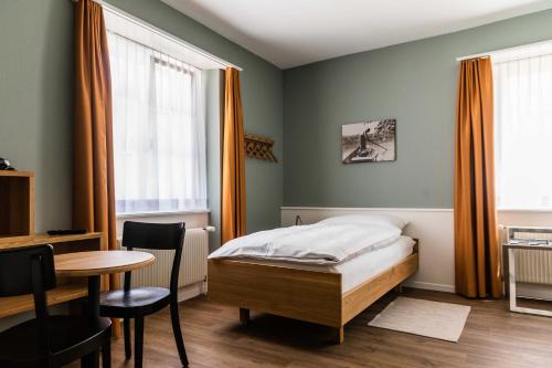 Postel nebo postele na pokoji v ubytování Landgasthof Adler
