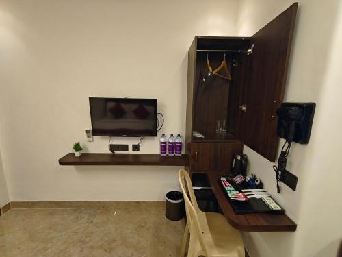 Televisyen dan/atau pusat hiburan di Woodlands Inn