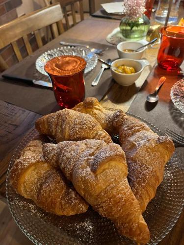 a plate of pastries sitting on a table at Casa Argenti in Arrone