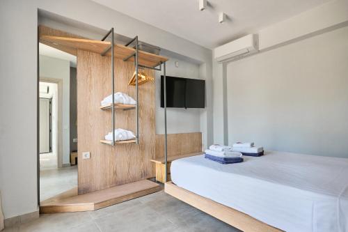 Ένα ή περισσότερα κρεβάτια σε δωμάτιο στο Ocean Private Villas - Pefkochori Halkidiki