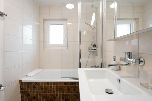 Koupelna v ubytování Apartment Raingüetli