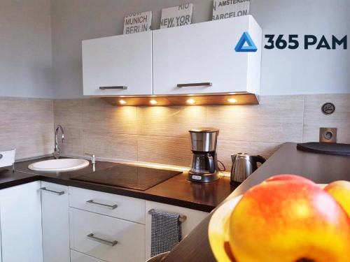 Kuchyňa alebo kuchynka v ubytovaní Europa Apartament - 365PAM