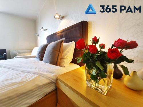 Posteľ alebo postele v izbe v ubytovaní Europa Apartament - 365PAM