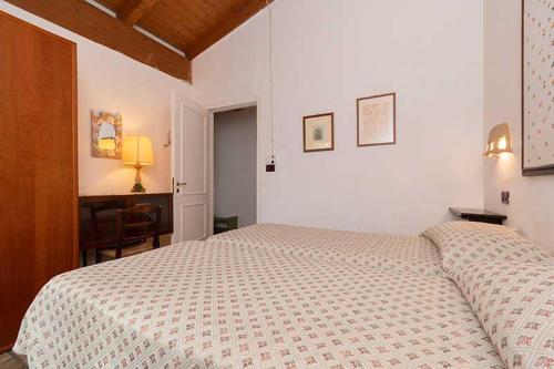 Ένα ή περισσότερα κρεβάτια σε δωμάτιο στο Masseria Barnabei Colonnella