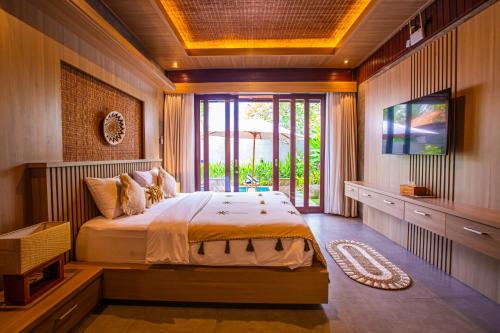 Katil atau katil-katil dalam bilik di Jero Kelodan Villa - Yeh Gangga