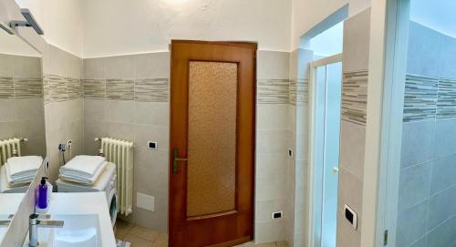 Koupelna v ubytování Idro Appartamenti - Vantone