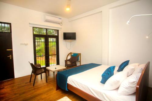 Giường trong phòng chung tại DLG Green Studio