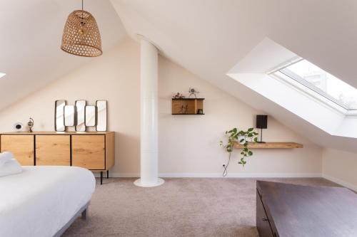 Postel nebo postele na pokoji v ubytování Maison Trégain - Grand Jardin et Terrasse