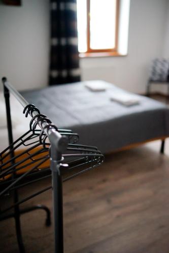 a bed in a room next to a window at Край Неба in Slavske