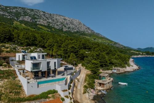Beachfront villa Mare with seaview and pool