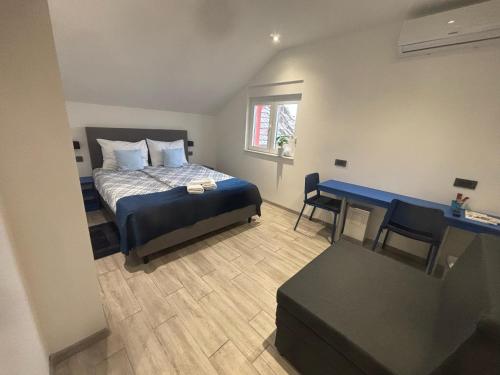 Posteľ alebo postele v izbe v ubytovaní Rooms Jelak