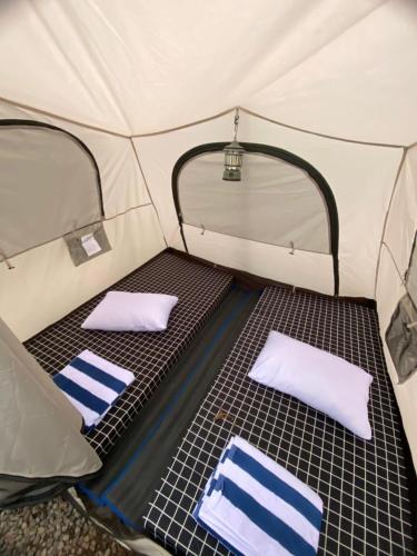 HeHa Waterfall Suites & Camping Groundにあるベッド