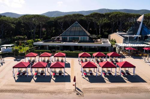 an aerial view of a resort with red roofs at Cala Beach Resort in Punta Ala
