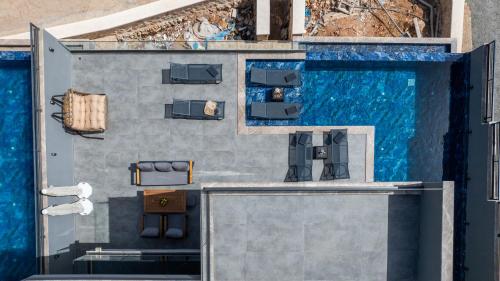 eine Darstellung eines Schwimmbads in einem Gebäude in der Unterkunft Villa Cihan Kalkan in Kaş