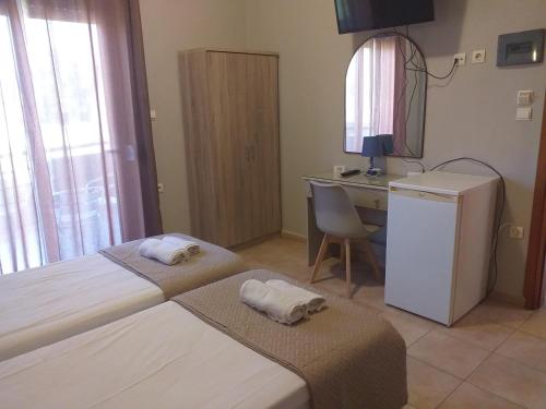 Кровать или кровати в номере Hotel Isidora