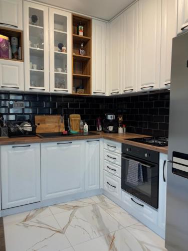 Kuchyň nebo kuchyňský kout v ubytování Luxury Park Villa