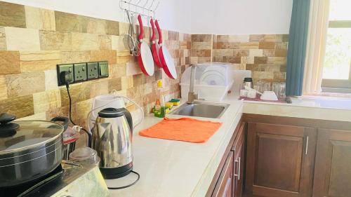 Una cocina o zona de cocina en Dilum Villa