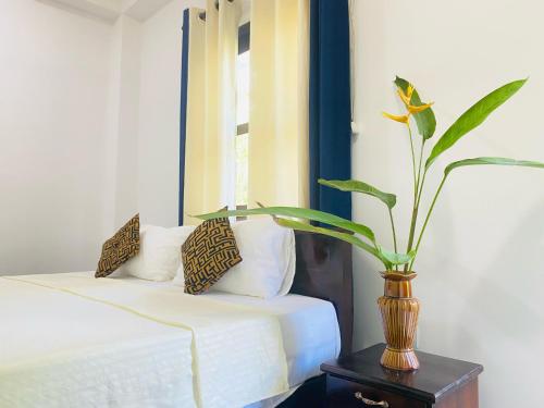 Cama o camas de una habitación en Dilum Villa