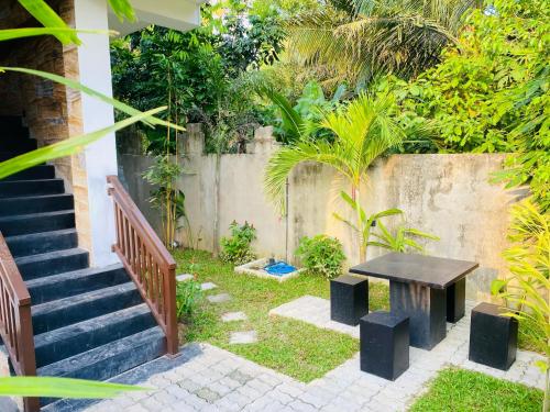 Jardín al aire libre en Dilum Villa