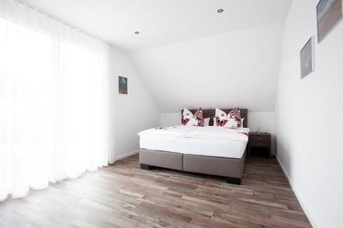 Postel nebo postele na pokoji v ubytování Ferienhaus Am Rösslewald
